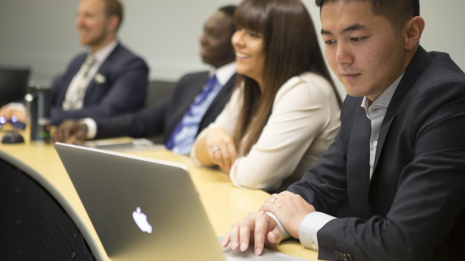Students listening to a lecture in class